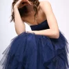 Abito lungo a bustier in tulle con volants