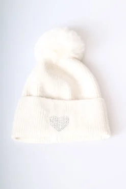 Berretto con pompon e cuore in strass