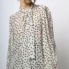 Blusa a stampa pois