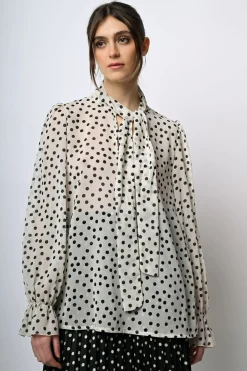 Blusa a stampa pois