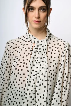 Blusa a stampa pois