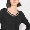 Cardigan con catenella decorativa