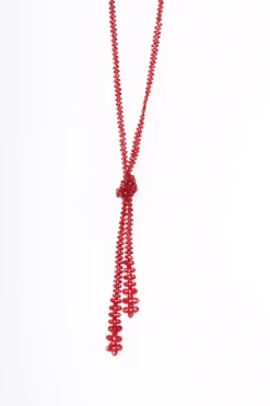 Collana lunga con perline e nodo