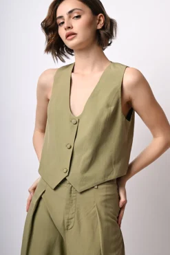 Gilet con bottone rivestito