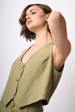 Gilet con bottone rivestito