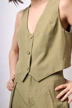 Gilet con bottone rivestito