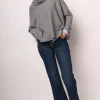 Jeans a gamba ampia con risvolto