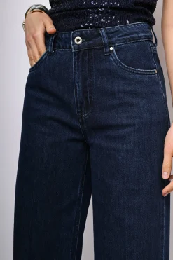 Jeans a gamba ampia con risvolto