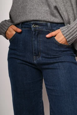 Jeans a gamba ampia con risvolto