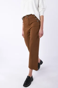 Jeans con bottoni
