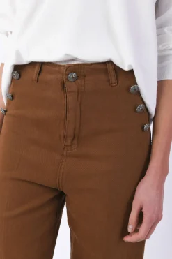 Jeans con bottoni