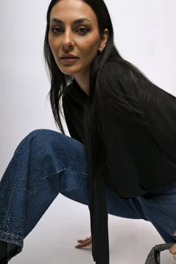 Jeans palazzo con strass