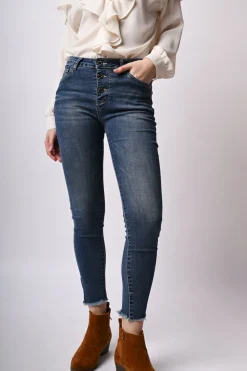 Jeans skinny con bottoni
