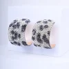 Orecchini con strass animalier
