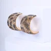 Orecchini con strass animalier