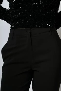 Pantaloni a sigaretta con piega stirata