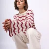 Pull crochet a righe con maniche svasate