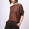 Pull in maglia crochet con fiocco sul retro
