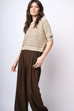 Pull in maglia crochet con fiocco sul retro