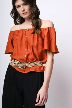 Top a spalle scoperte con bottoni