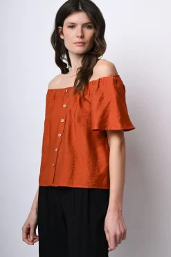 Top a spalle scoperte con bottoni