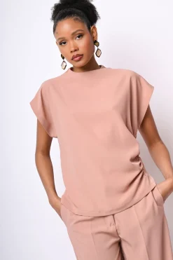 Top con arricciatura e bottoni sul retro