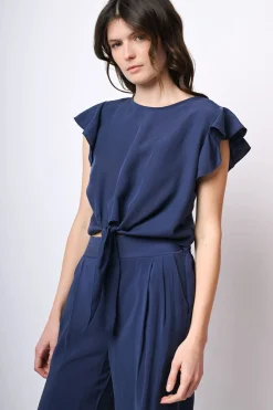 Top crop con nodo alla vita