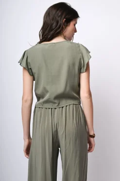 Top crop con nodo alla vita