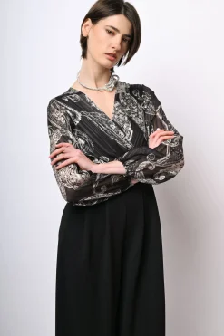 Tuta bi-materiale con stampa paisley