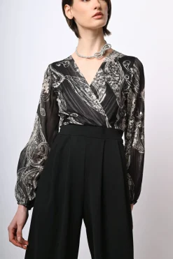 Tuta bi-materiale con stampa paisley